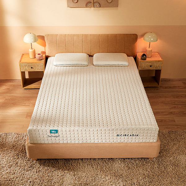 Beige bed with Circadia mattress in a bedroom setting