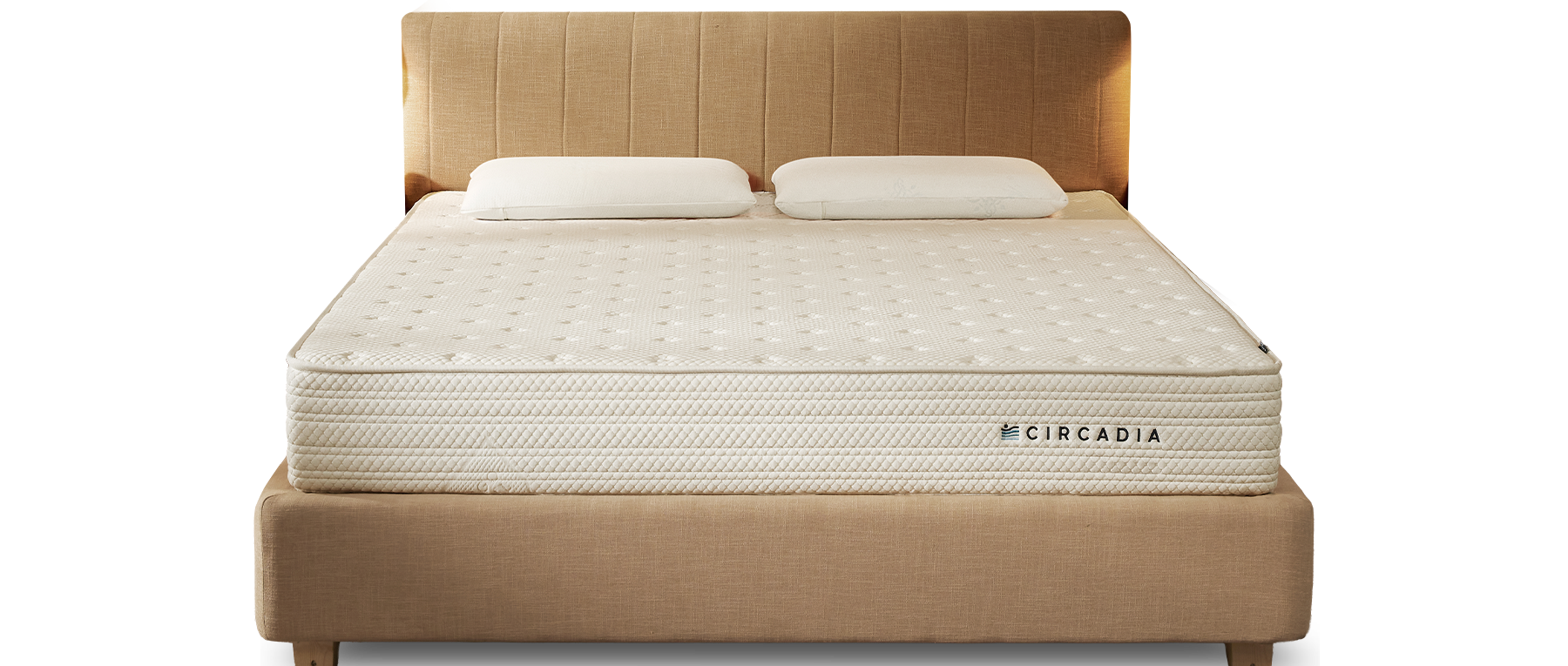 Circadia mattress on a bed with a beige headboard on a white background