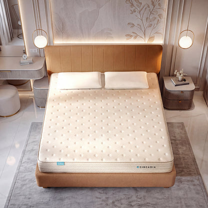 Mattress on a bed in a modern bedroom setting with Circadia branding.