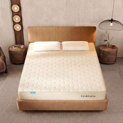Beige mattress with 'Circadia' branding in a bedroom setting.