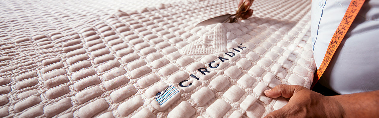 Person measuring a textured surface with 'Circulux' branding